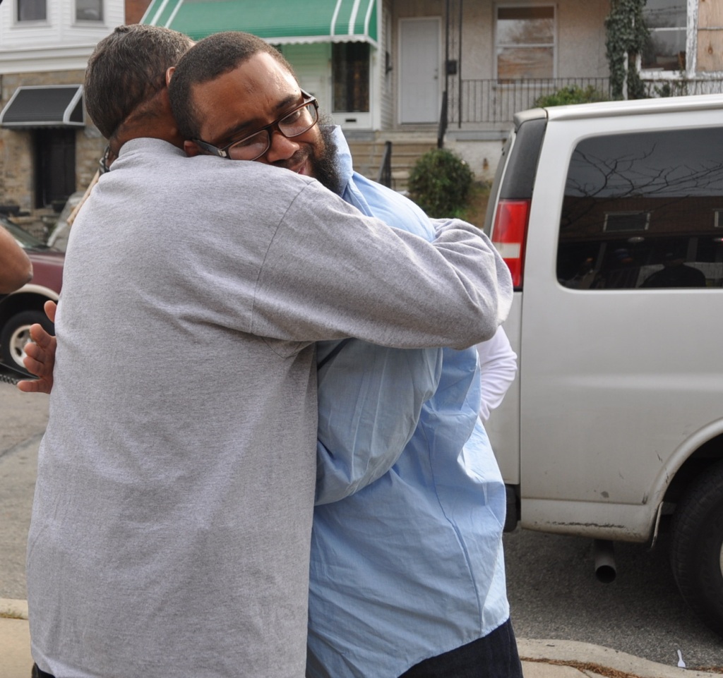 Eugene Gilyard hugs his father after returning home on November 18th, 2013. Gilyard was wrongfully convicted in 1995 and spent 15 years in prison. Photo: PA Innocence Project